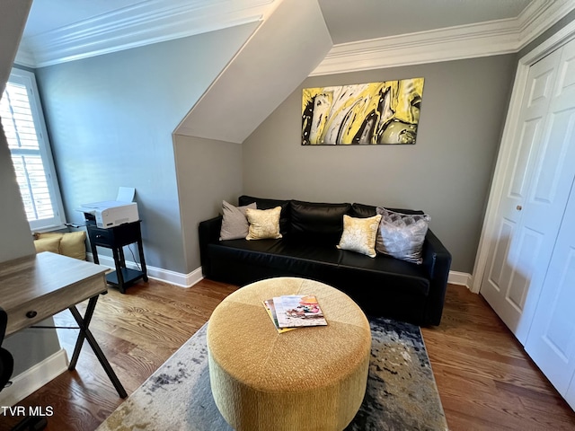 living room with ornamental molding and wood-type flooring