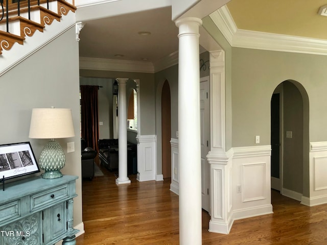 hallway featuring dark wood-type flooring and crown molding