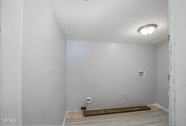 washroom featuring hardwood / wood-style flooring and hookup for a washing machine