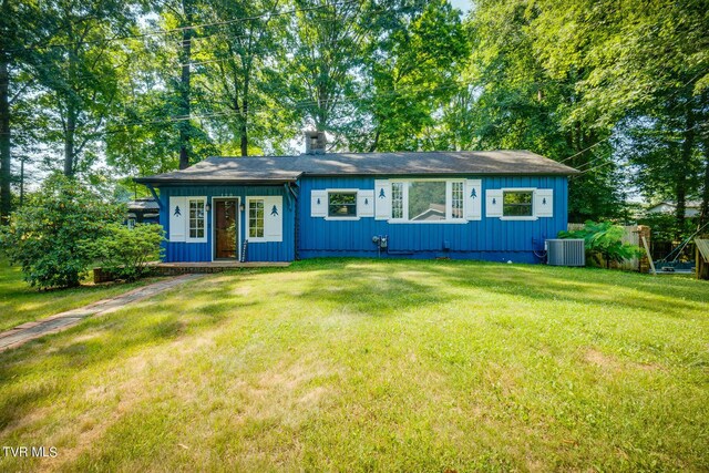 120 Rock Rd, Bristol, TN 37620 - view of front of house with a front lawn, central AC unit, board and batten siding, and a chimney