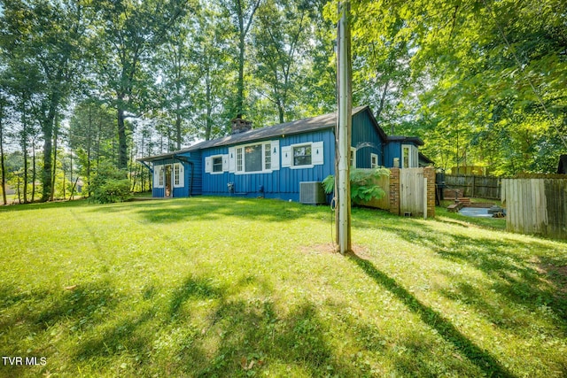 120 Rock Rd, Bristol, TN 37620 - view of front of property with board and batten siding, central AC, and a chimney