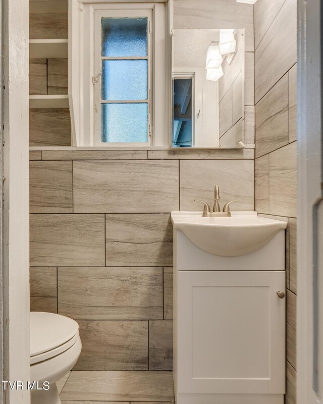 120 Rock Rd, Bristol, TN 37620 - half bathroom featuring vanity and toilet