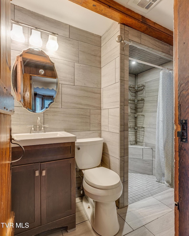 120 Rock Rd, Bristol, TN 37620 - bathroom with walk in shower, toilet, vanity, and tile patterned flooring