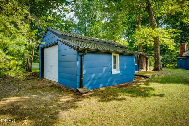 120 Rock Rd, Bristol, TN 37620 - detached garage with view of wooded area