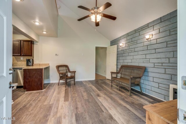 120 Rock Rd, Bristol, TN 37620 - living area with ceiling fan, wood finished floors, high vaulted ceiling, and baseboards