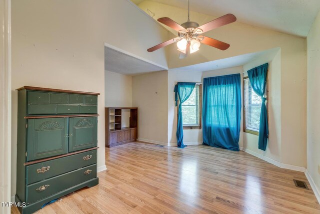 120 Rock Rd, Bristol, TN 37620 - empty room featuring light wood-style floors, ceiling fan, vaulted ceiling, and baseboards