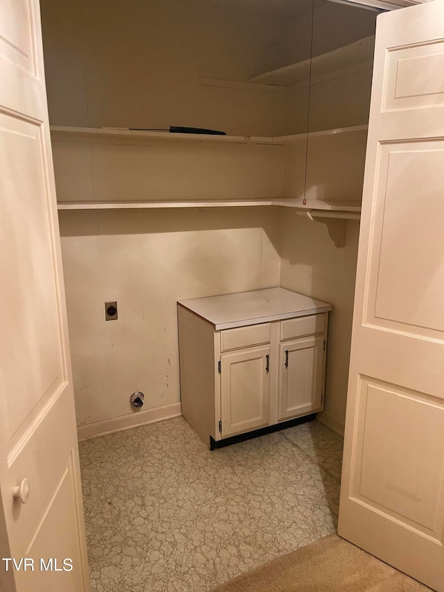 laundry room featuring hookup for an electric dryer