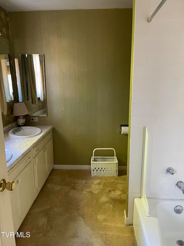 bathroom with vanity and shower / washtub combination