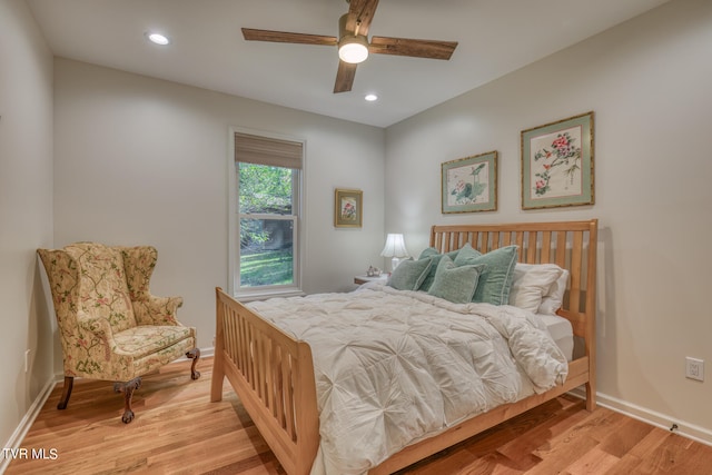 bedroom featuring ceiling fan and light wood-type flooring