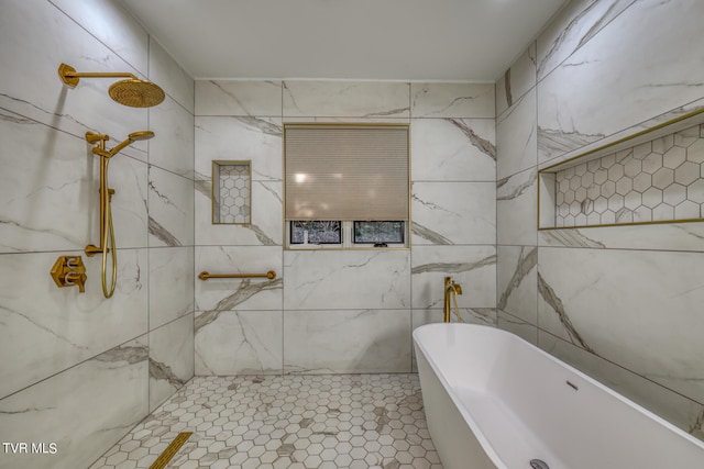 bathroom with separate shower and tub, tile walls, and tile patterned floors