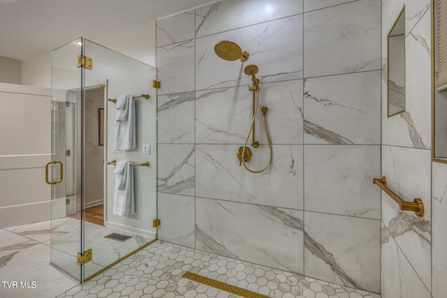 bathroom featuring an enclosed shower