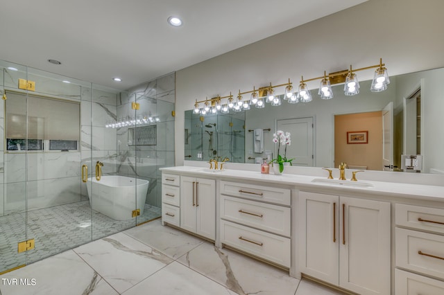 bathroom featuring separate shower and tub and vanity