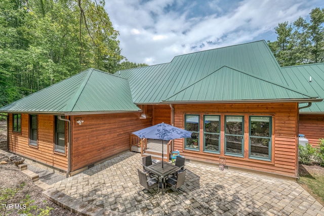 rear view of property with a patio area