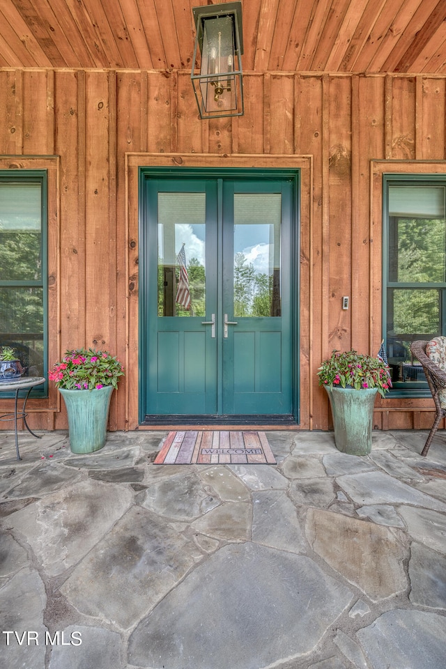 property entrance featuring french doors