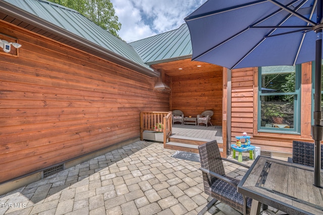 view of patio with a deck