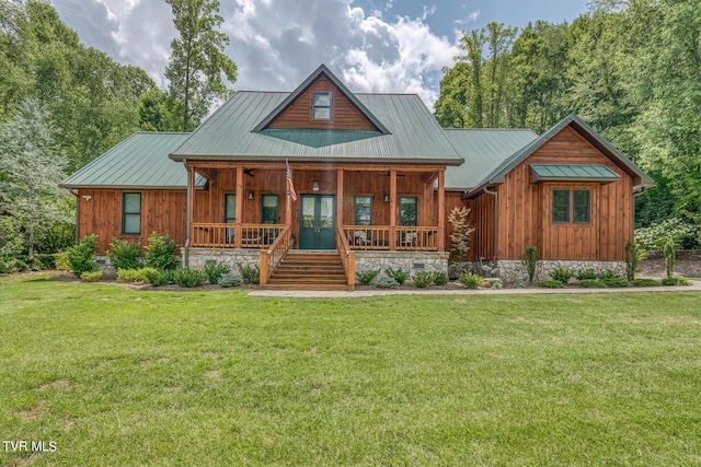 view of front of home featuring a porch and a front lawn