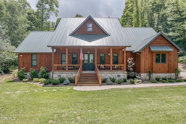 view of front of home with a front lawn and covered porch