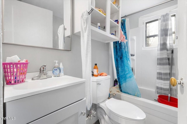 full bathroom with vanity, toilet, and shower / bath combo with shower curtain