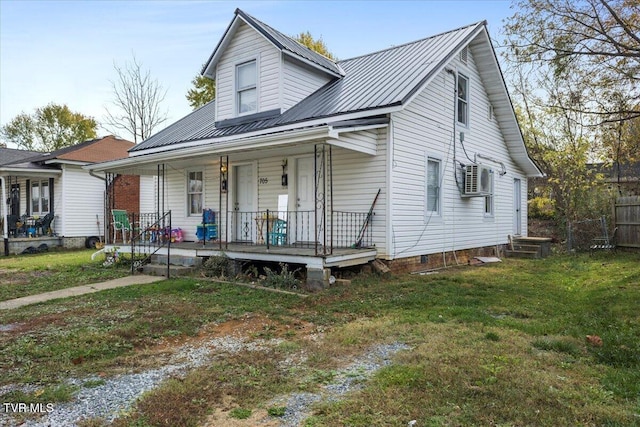 view of front of house featuring covered porch and a front yard