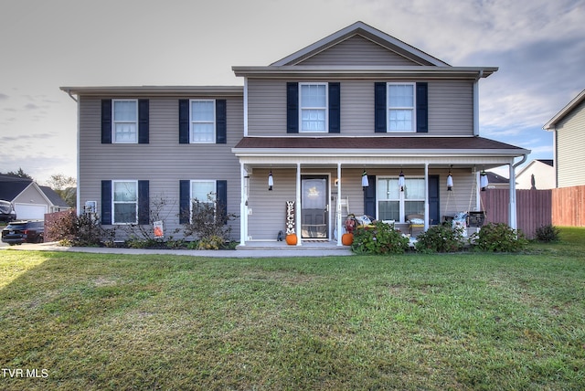 view of front facade with a porch and a front yard