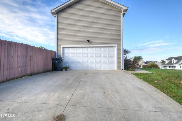 garage featuring a yard