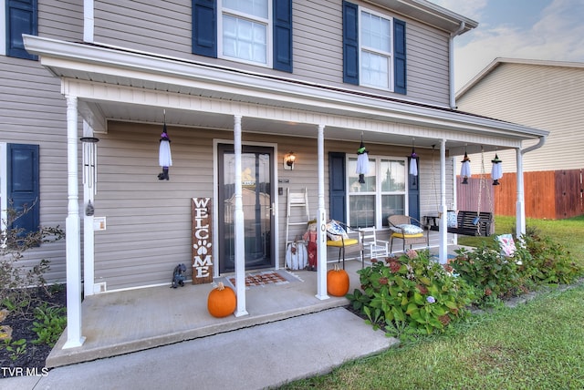 entrance to property with a porch