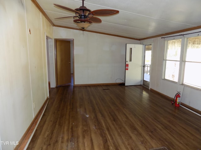 unfurnished room featuring crown molding, ceiling fan, and dark wood-type flooring