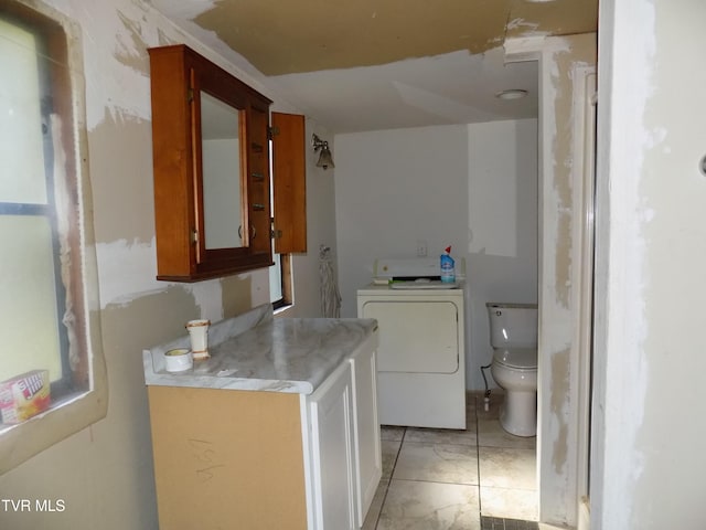 clothes washing area featuring washer / clothes dryer