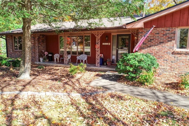 entrance to property with covered porch