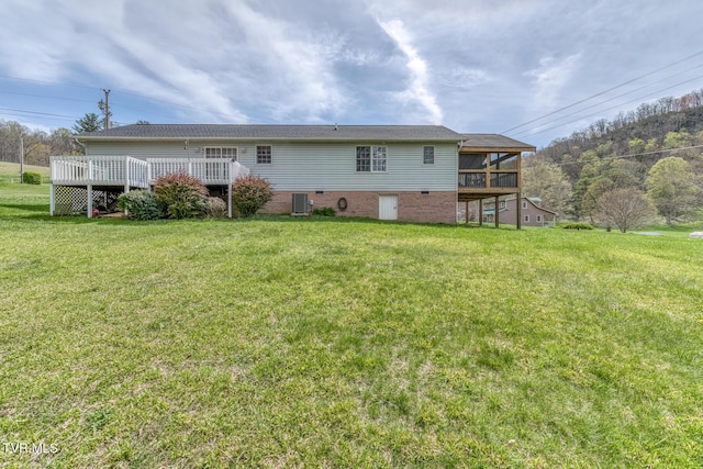 105 Buckner Dr, Roan Mountain, TN 37687 - back of house with a wooden deck, a yard, and central AC