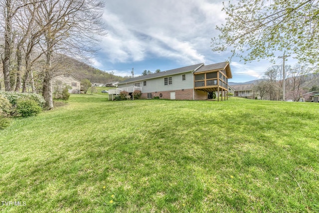 105 Buckner Dr, Roan Mountain, TN 37687 - view of yard with a sunroom