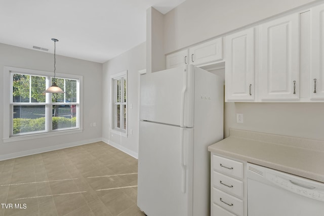 kitchen with white cabinets, white appliances, and hanging light fixtures