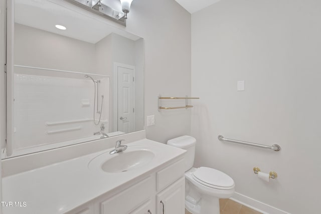 bathroom featuring a shower, tile patterned floors, vanity, and toilet