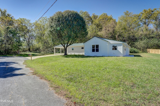 exterior space with a yard