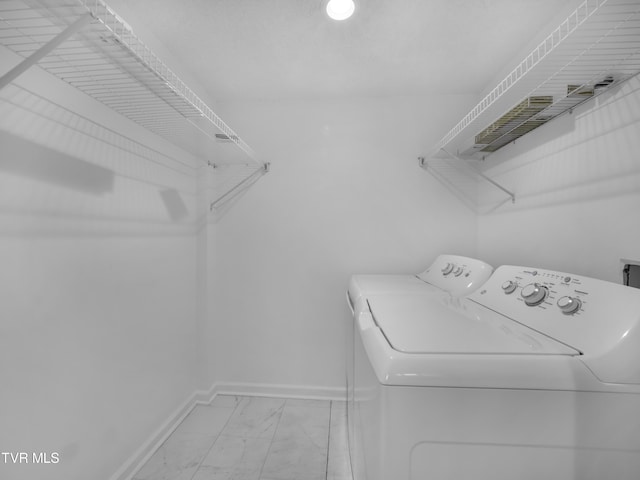 laundry area featuring independent washer and dryer