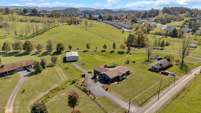 aerial view with a mountain view and a rural view