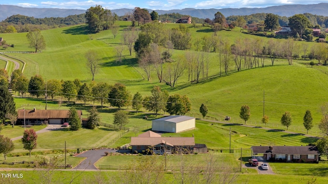 bird's eye view with a mountain view and a rural view