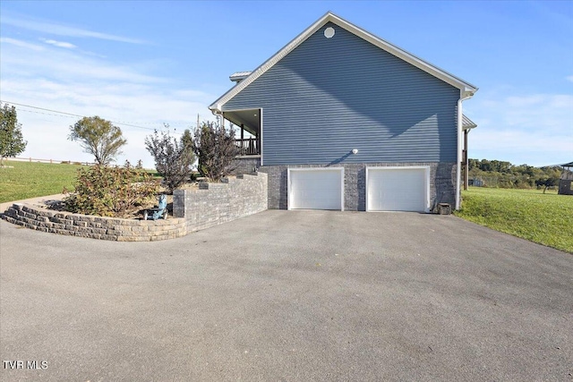 view of side of property featuring a garage