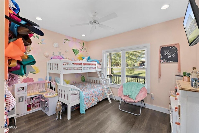 bedroom featuring ceiling fan and dark hardwood / wood-style floors