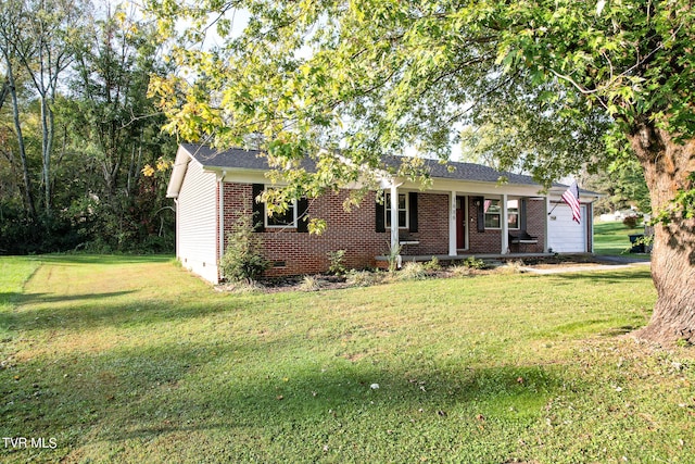 ranch-style house with a front yard and a garage