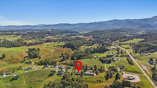 drone / aerial view featuring a mountain view