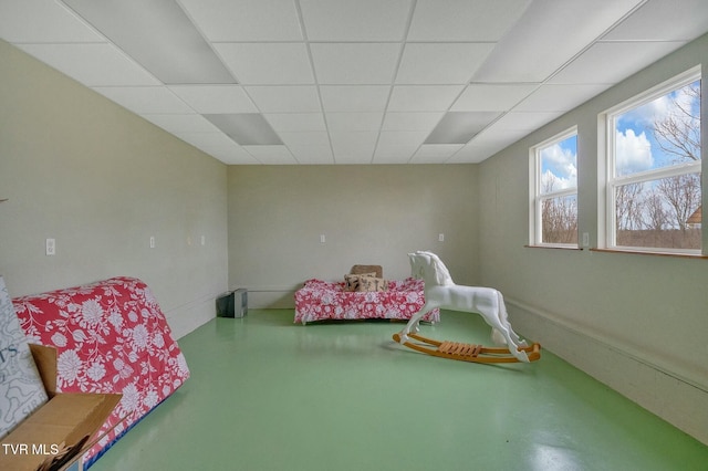 bedroom featuring a paneled ceiling