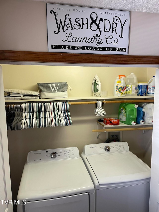 laundry area featuring independent washer and dryer