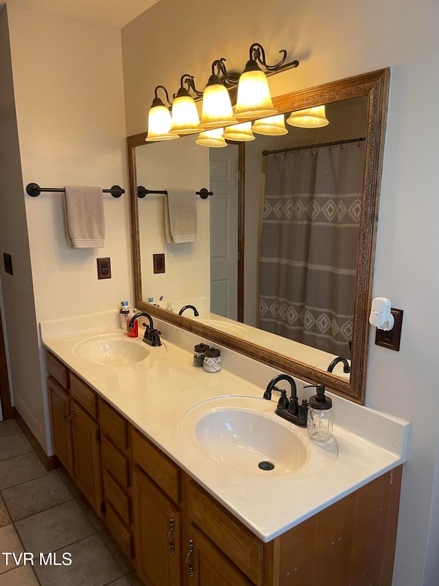 bathroom featuring vanity and tile patterned flooring