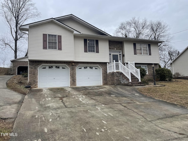 split foyer home featuring a garage