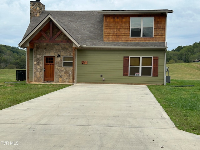 view of front of home with a front yard