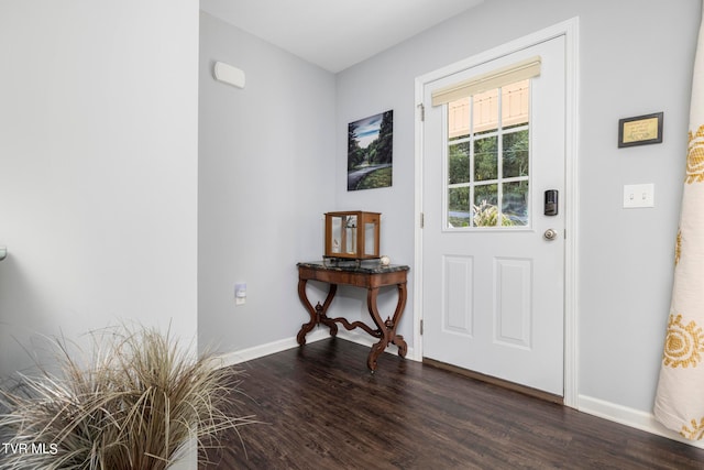 foyer entrance featuring dark hardwood / wood-style floors