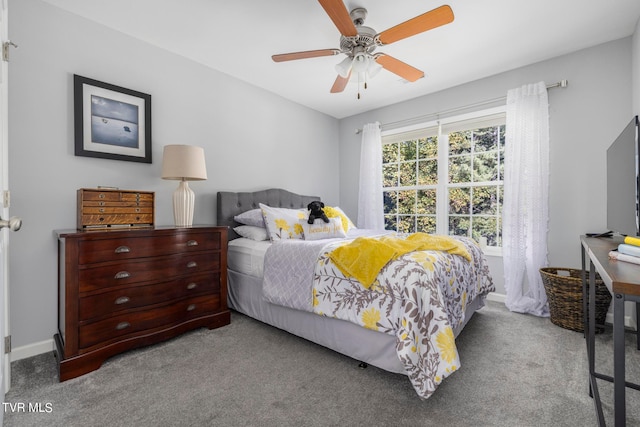 carpeted bedroom featuring ceiling fan