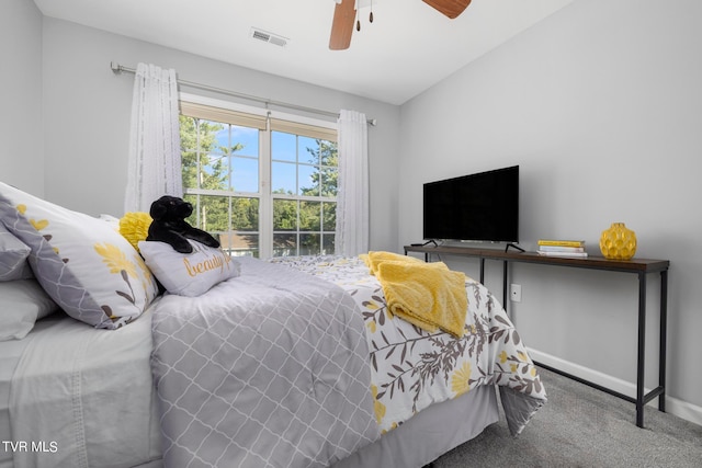 carpeted bedroom with ceiling fan