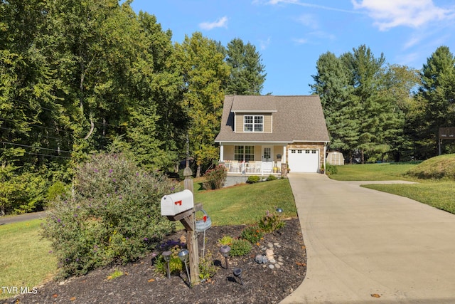 cape cod home featuring a front lawn, covered porch, and a garage